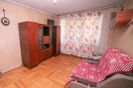 old apartment. apartment Russia. Moscow. cheap housing. the apartment where grandma lives. room with poor old repairsの写真素材