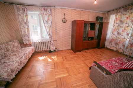 old apartment. apartment Russia. Moscow. cheap housing. the apartment where grandma lives. room with poor old repairsの写真素材