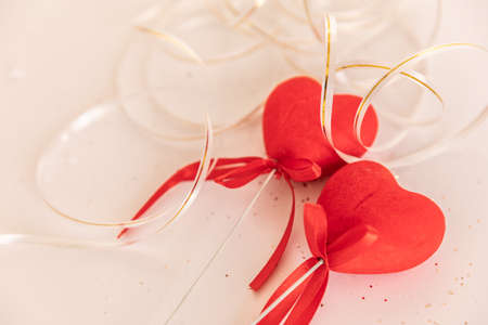 lovers' day. Valentine's Day. Two red hearts on a white isolated background.の写真素材