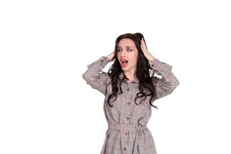 Young woman angry shouts on white