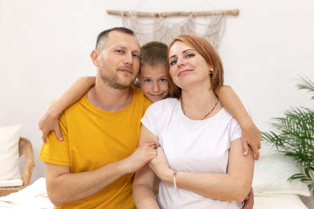 mother and father with a son. boy with parents. the concept of the family