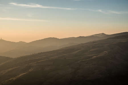Sun in the moring paint the mountain with light.の写真素材