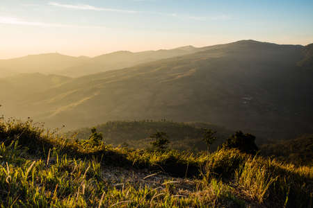 Sun in the moring paint the mountain with light.の写真素材