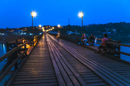 SAGKLABURI THAILAND- MARCH 10 : Unidentified tourists are chillout at the longest wood bridge of Thailand on March 10, 2016 at Mon Bridge.のeditorial素材