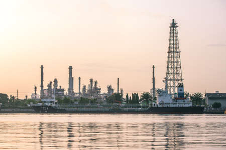 Platforms, smokestack and chimney of oil refinery.の写真素材