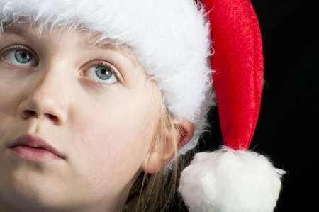 Girl dreaming of christmasの写真素材