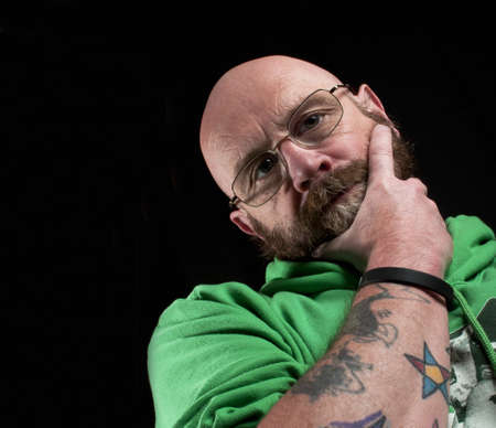 Worried man deep in thoughtの写真素材