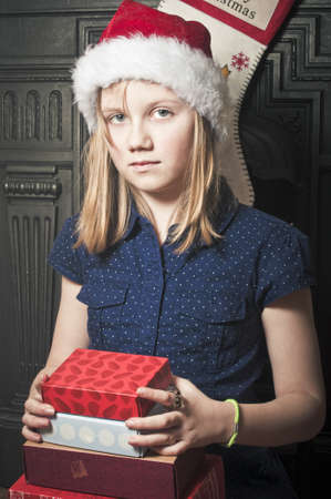 Child with christmas presentsの写真素材