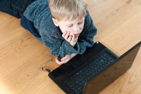 Child using a computerの写真素材