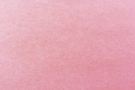 Close-up shot of light pink paper texture pattern for backgroundの写真素材