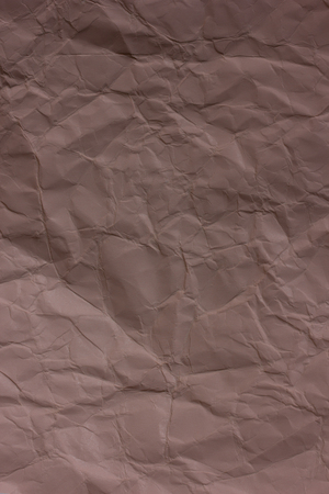 Brown crumpled paper background textureの写真素材