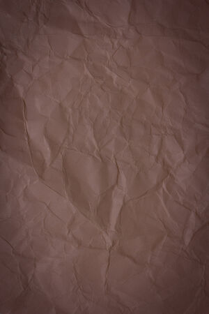 Brown crumpled paper background textureの写真素材
