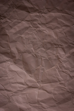 Brown crumpled paper background textureの写真素材