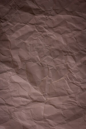 Brown crumpled paper background textureの写真素材