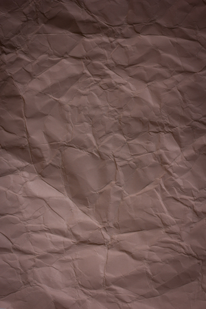 Brown crumpled paper background textureの写真素材