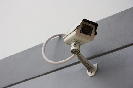 CCTV security camera on the front of building