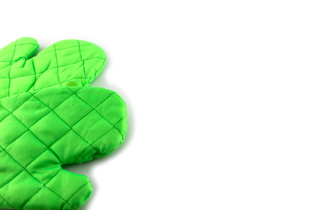 Green oven glove on isolated white backgroundの写真素材