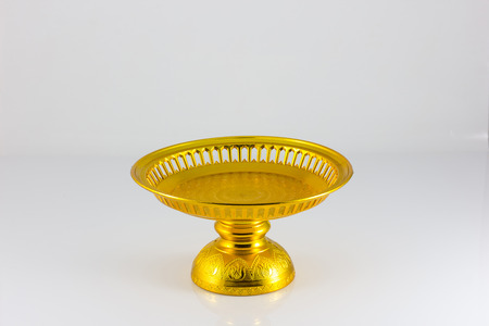 golden ware isolate in white backgroundの写真素材