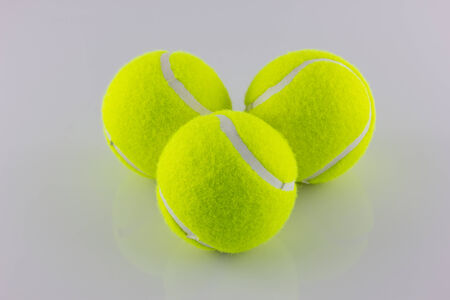 Tennis balls isolate on white backgroundの写真素材