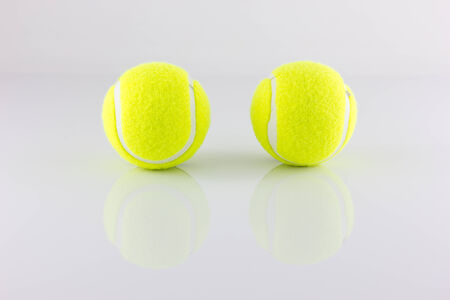 Tennis balls isolate on white backgroundの写真素材