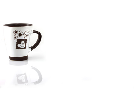 White coffee cup with a handle isolate on white backgroundの写真素材