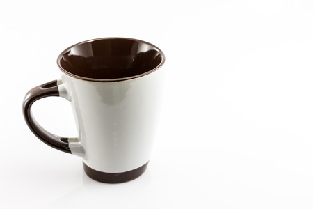 White coffee cup with a handle isolate on white backgroundの写真素材