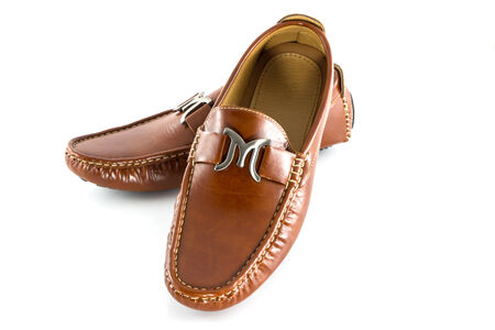 Men shoes in brown color isolate on white backgroundの写真素材
