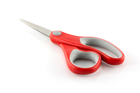 red scissors isolate on white backgroundの写真素材