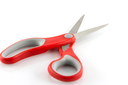 red scissors isolate on white backgroundの写真素材