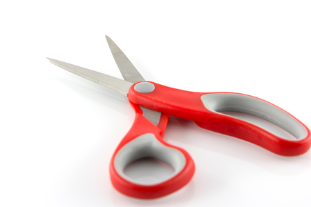 red scissors isolate on white backgroundの写真素材