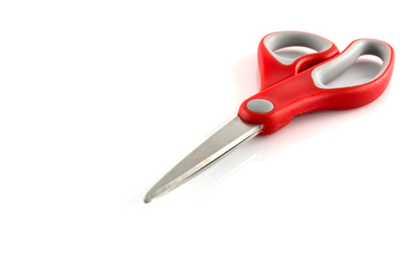 red scissors isolate on white backgroundの写真素材