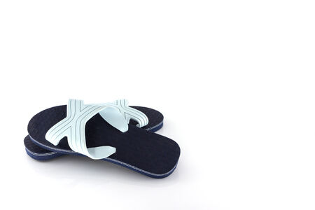 Blue slippers isolate on white backgroundの写真素材