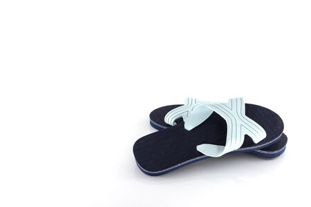 Blue slippers isolate on white backgroundの写真素材