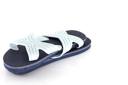 Blue slippers isolate on white backgroundの写真素材