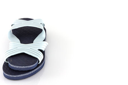 Blue slippers isolate on white backgroundの写真素材