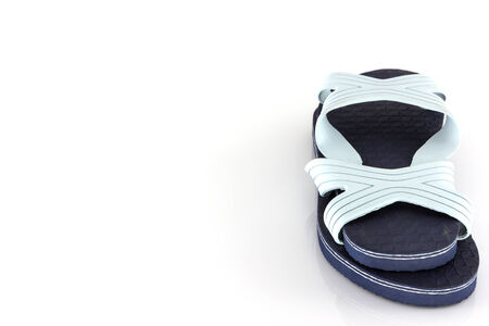 Blue slippers isolate on white backgroundの写真素材