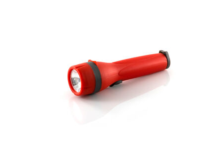 Red flashlight isolate on white backgroundの写真素材