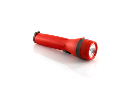 Red flashlight isolate on white backgroundの写真素材