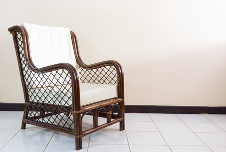 wicker chair in the morning lightの写真素材