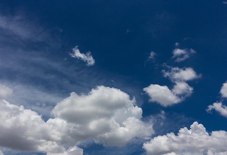 Thick cloud over blue sky on a sunny dayの写真素材