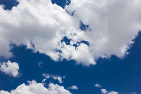 Thick cloud over blue sky on a sunny dayの写真素材