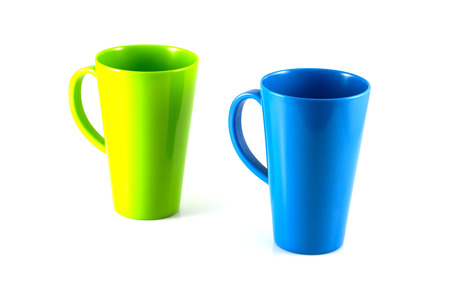 Green and blue cup isolate on white backgroundの写真素材