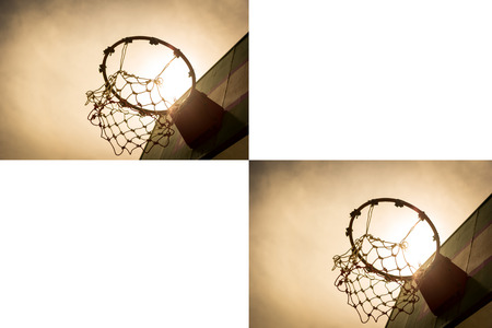 Wooden basketball hoop during sunset.の写真素材