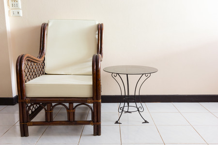 Wicker chair set in the morning lightの写真素材