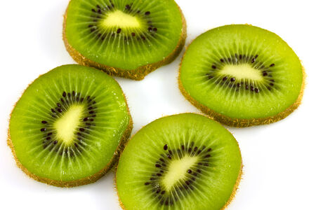 Sliced ââkiwi isolate in white backgroundの写真素材