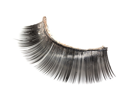 Use artificial eyelashes macro Isolated on ,Through the use of eyelashesの写真素材