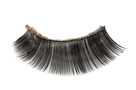 Use artificial eyelashes macro Isolated on ,Through the use of eyelashesの写真素材