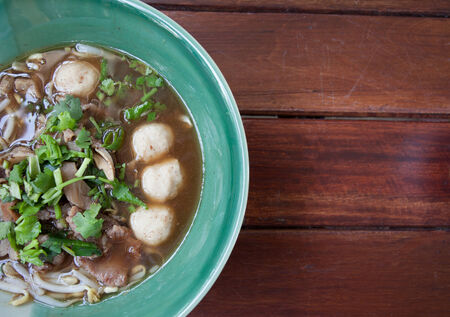 bowl of pungent thai pork noodle soupの写真素材