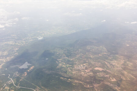 Blue sky with clouds background on the airplanの写真素材