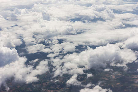 Blue sky with clouds background on the airplanの写真素材